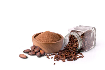 Cocoa nib in glass bottle and chocolate powder  in wooden bowl with dry cacao beans isolated on white background.