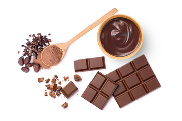 Dark chocolate cream and cocoa powder in wooden spoon with cacao beans isolated on white...