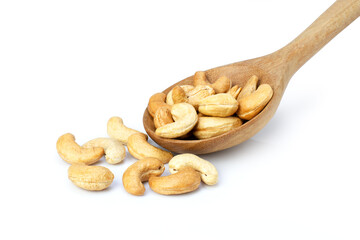 Roasted cashew nut in wooden ladle isolated on white background