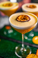sweet and sour refreshing pornstar martini cocktail on the bar counter