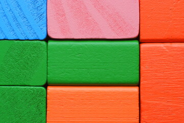 Color blocks. Multicolored wooden cubes. Multicolored blocks. Wooden blocks. Children's constructor. Building material.