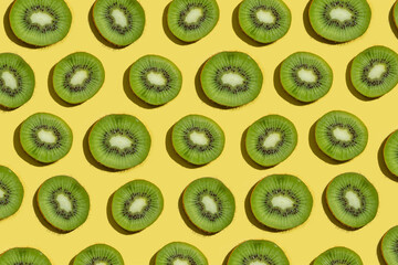 Pattern of kiwi fruits overhead view flat lay