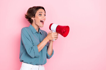 Photo of young adorable pretty nice perfect positive woman hold loudspeaker scream protest looking...