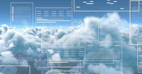 Image of interface with processing data over blue cloudy sky