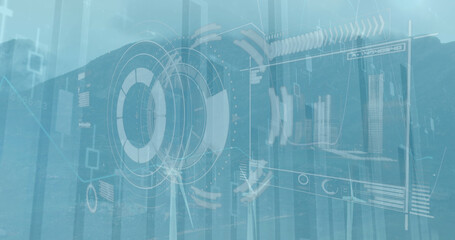 Image of round scanner and data processing over spinning windmills on grassland