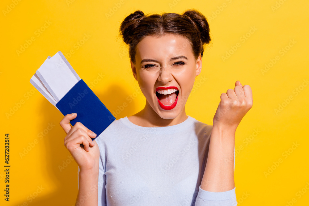 Sticker Photo of cheerful lady screaming fist up hold visa resort tickets lottery win isolated shine color background