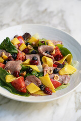 Antipasto salad with fresh meat, cheese and vegetables