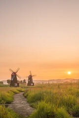 Fototapeta premium windmill in the sunset