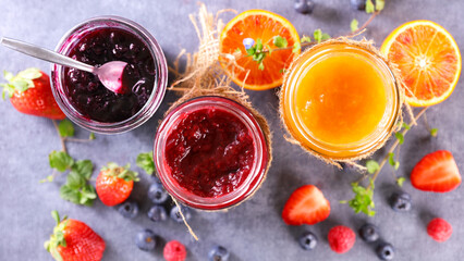 assorted of fruit jam and fresh fruits