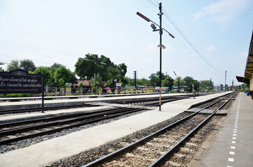 Fototapeta na wymiar Track of railway in rural countryside for locomotive train running journey at Ayutthaya station on May 1, 2014 in Phra Nakhon si Ayutthaya, Thailand