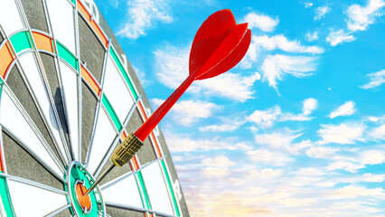 Close up shot red darts arrows in the target ,arrow hitting the center of a shooting target for...