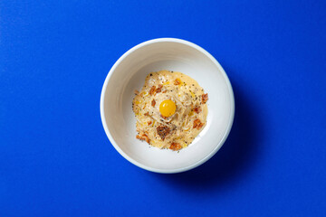 Carbonara with eel and squid in a creamy sauce