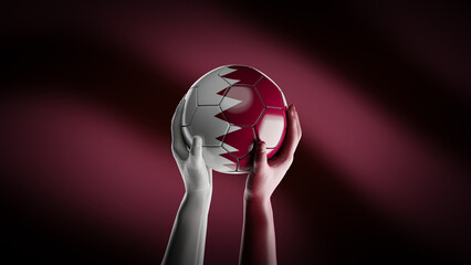 Soccer ball in the hands in the color of the Qatar flag - football world championship concept