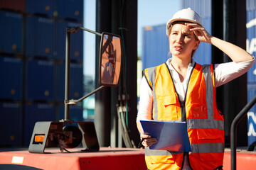 factory workers or engineer feeling tired for working in containers warehouse storage