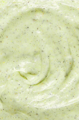 The texture of a cosmetic scrub. Exfoliating skin care product