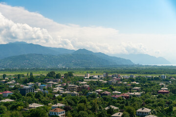 Beautiful landscape on private houses against the background of mountains on a summer day, Batumi, Georgia