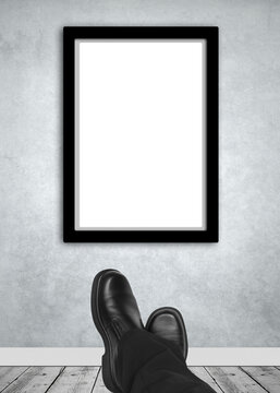 Relaxed businessman enjoying framed artwork mockup, transparency to add your own artwork