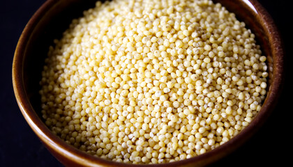 uncooked millet in a bowl