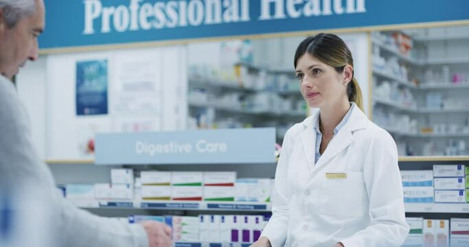 Pharmacist, senior customer or communication help for medicine, pharmacy healthcare product or insurance pills. Woman, employee or wellness worker with tablet in drugs retail store with medical trust