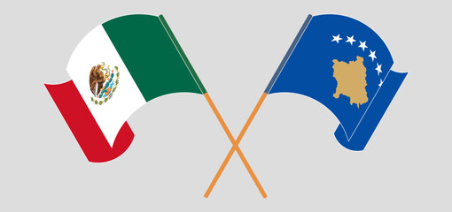 Crossed and waving flags of Mexico and Kosovo