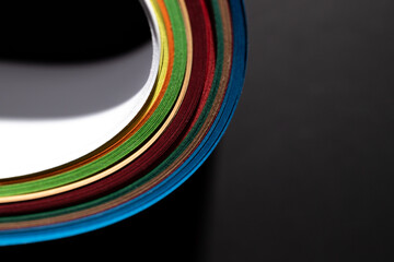 Abstract color rainbow strip curl line paper background.