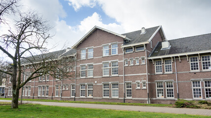 Fototapeta na wymiar Prins Maurits Military Complex in Ede, Gelderland in the Netherlands. The complex has now been converted into modern houses and appartments.