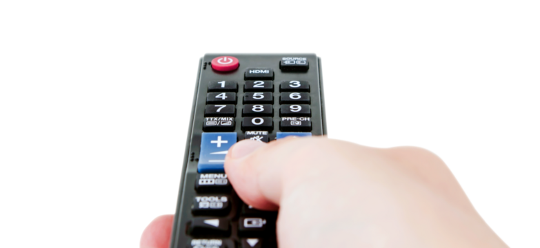 Hand holding remote control, isolated