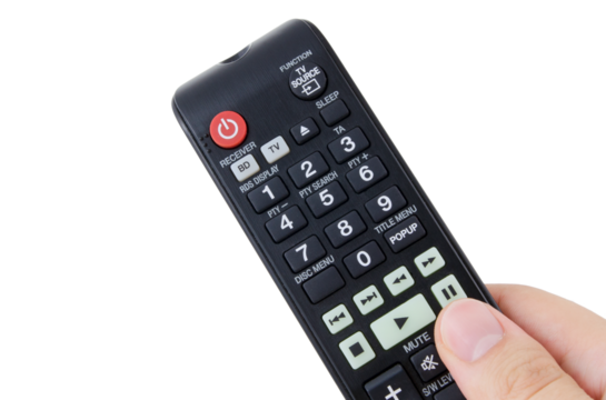 Hand holding remote control, isolated