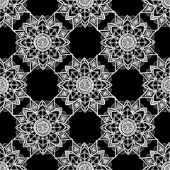 vector SEAMLESS geometric mandala PATTERN with isolated white lines on black . Geometric pattern of mandalas intersecting with each other, for the frame of the design template module for print design