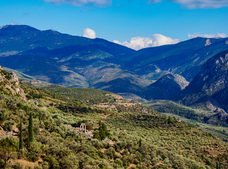 Fototapeta na wymiar View towards the Tholos of Delphi, Temple of Athena Pronaia, Delphi, Phocis, Greece