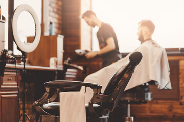 Fototapeta na wymiar Barbershop armchair vintage color. Modern hairdresser and hair salon, barber shop for men