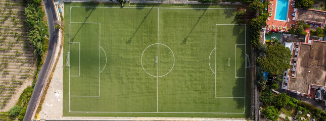 Soccer field in the countryside, aerial view from drone © jovannig