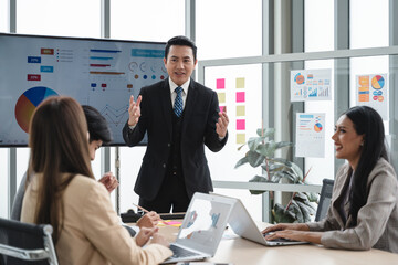 Office colleagues having casual discussion during meeting in conference room, Business and office concept, business team with laptop computers and documents
