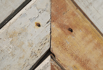 rustic weathered barn wood background with knots and nail holes