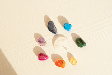 Healing crystals on brown background