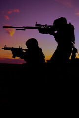 Sniper and his buddy at sunset