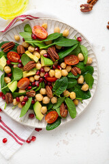 healthy food vegan avocado salad with greens and chick pea