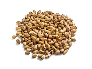 A scattering of pistachio nuts on a white background
