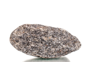 Fototapeta na wymiar One granite stone, close-up, isolated on a white background.