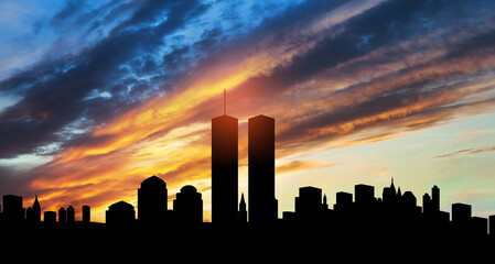 Fototapeta na wymiar New York skyline silhouette with Twin Towers at sunset. 09.11.2001 American Patriot Day banner.