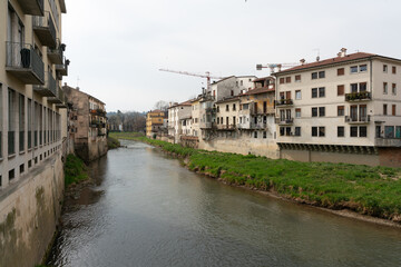 Fototapeta na wymiar View over Bacchiglione from Ponte degli Angeli in Vicenza, Italy.
