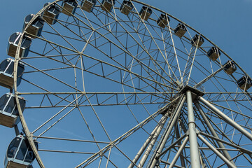 Part of the design of the Ferris wheel with booths.