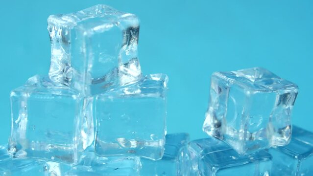 close up of many ice cubes on white background 