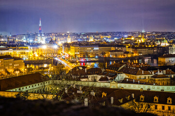 A night view of Prague and its rooftops