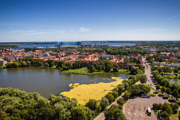 A view of a seaside city over the rooftops