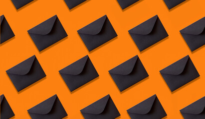 seamless pattern black envelopes on orange background
