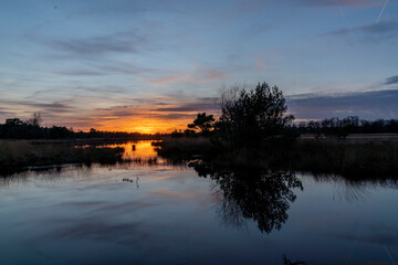 Sunset view over lakeside with beautiful colours and reflection