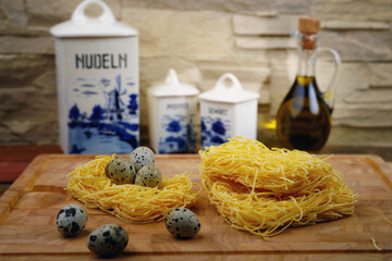 Italian pasta with quail eggs. Homemade food. Rustic.