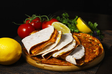 Lahmajoun Lahmajo Lahmajoon - oriental dish of minced meat on a flatbread. Shallow depth of field