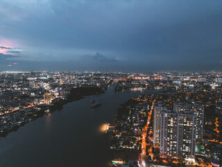 Aerial view of a buildings with highway at night in Ho Chi Minh city, Vietnam